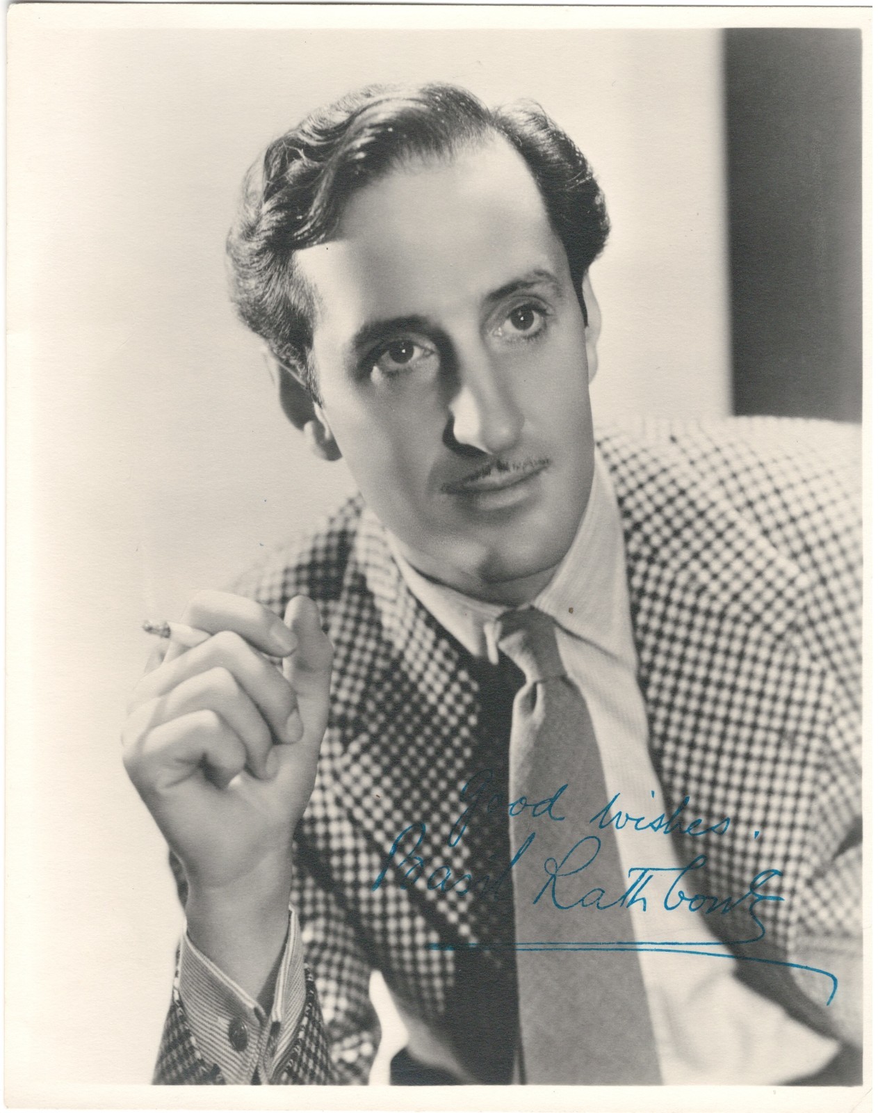 Basil Rathbone. Famous for 14 Sherlock Holmes movies. Signed 8x10 photo. COA