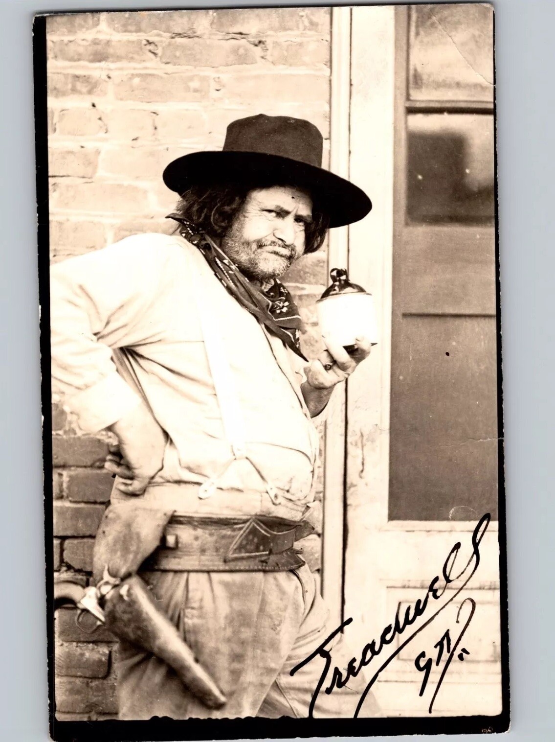 c1935 Cowboy Man Drinking Moonshine Revolver Bandana Signed “Treadwell” RPPC