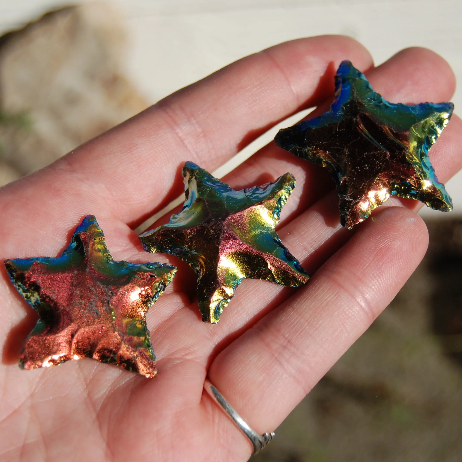 ONE 1.25in Titanium Aura Obsidian Star, Hand Knapped Crystal Stars