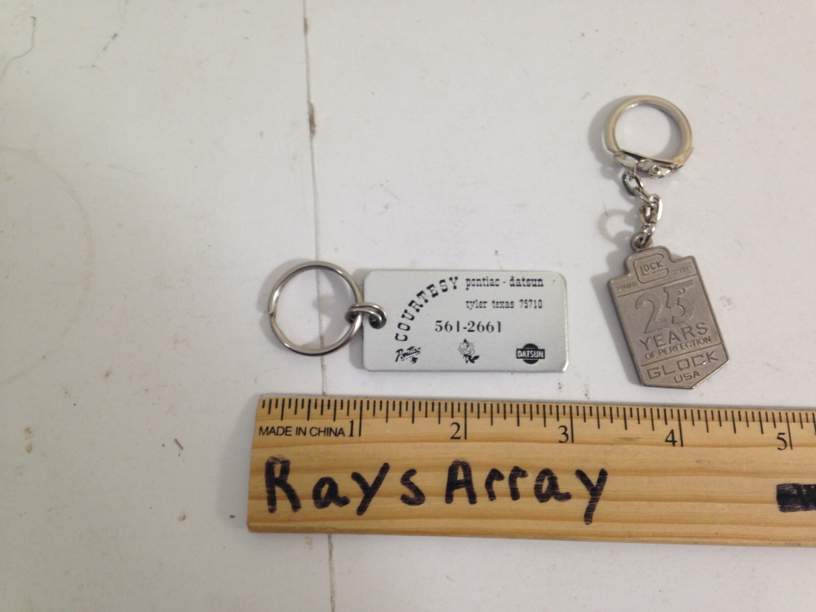 Vtg Courtesy Pontiac Datsun Dealership Key Ring Tyler TX / Glock 25th keychain
