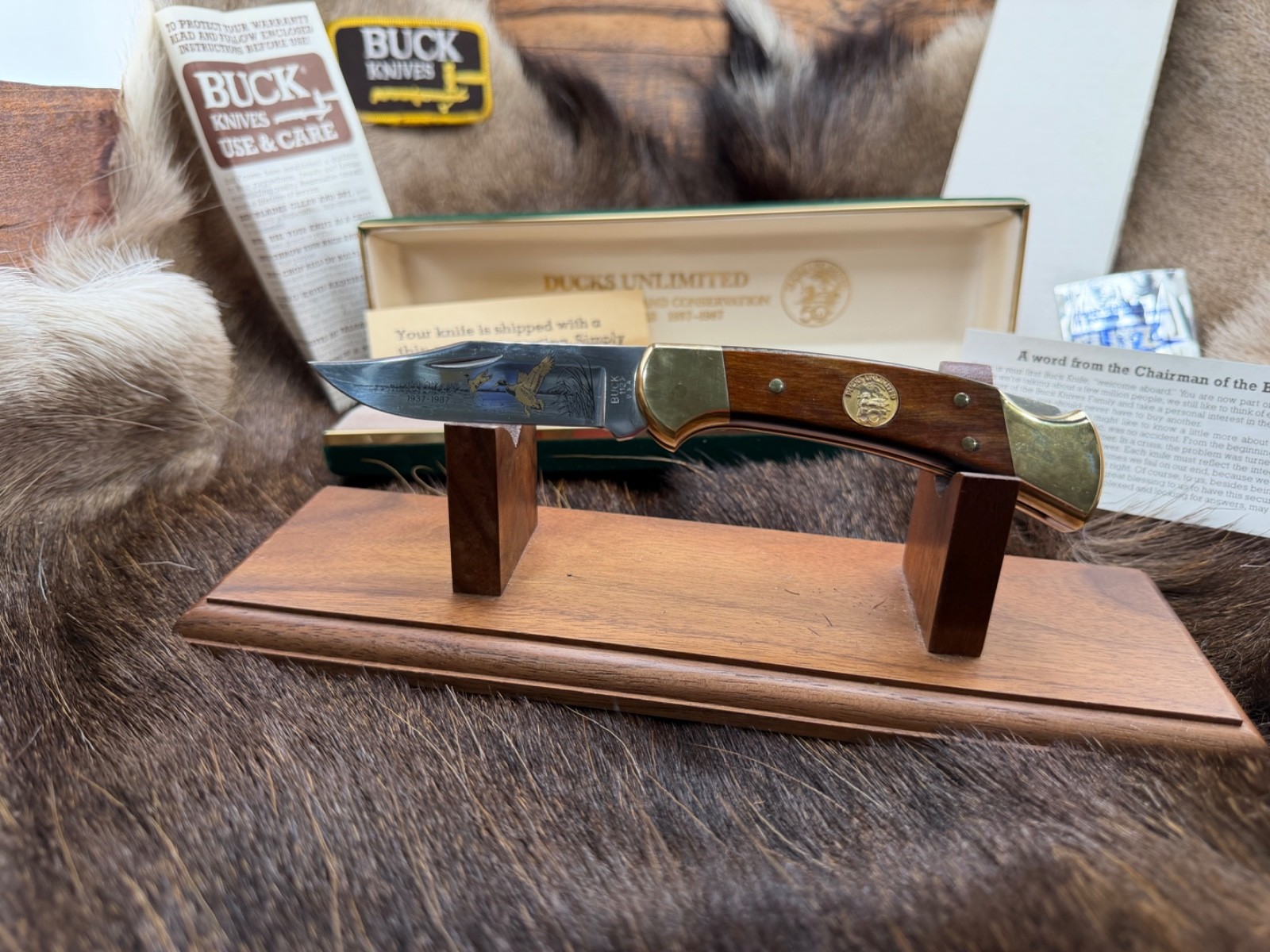 1987 Buck 112 Duck's Ltd. Folding  Knife With Rosewood Handles &  Mint In Box
