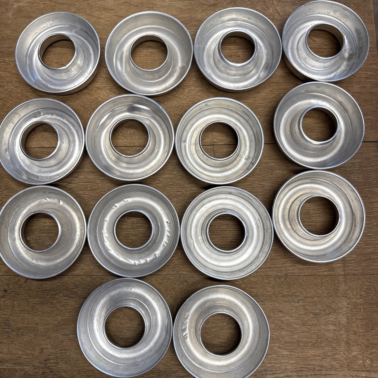 Set Of 14 Vintage Aluminum Molds In Donut Shape