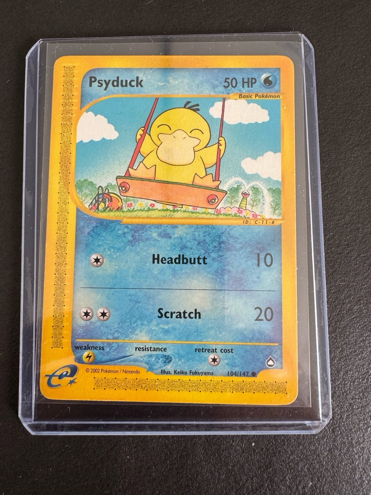 Psyduck 104/147 Aquapolis Vintage Pokemon Card US Psykokwak Exc