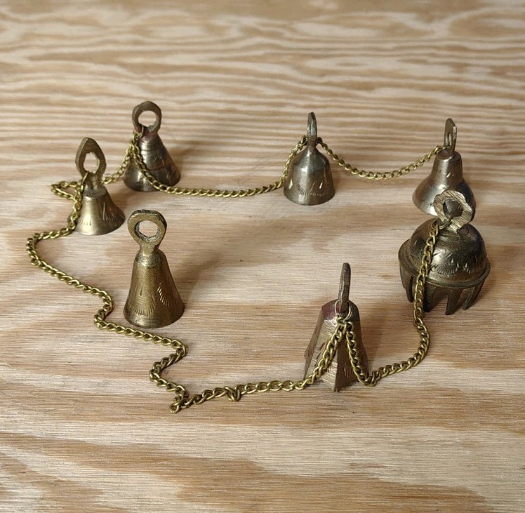 Vintage Chain of 7 Etched Brass Monastery Temple Camel Ringing Bells Wind Chime Vintage Chain of 7 Etched Brass Monastery Temple Camel Ringing Bells Wind Chime