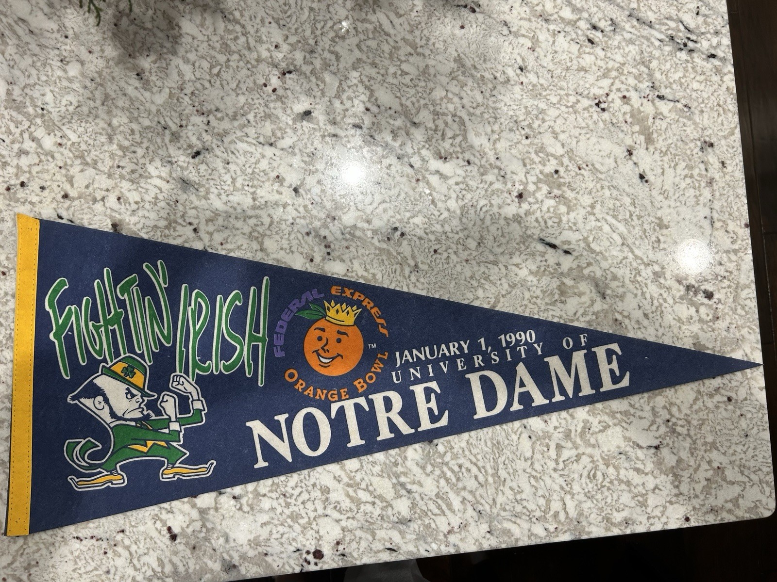 Vintage Blue Notre Dame Football 1990 FedEx Orange bowl pennant. Vintage Blue Notre Dame Football 1990 FedEx Orange bowl pennant.