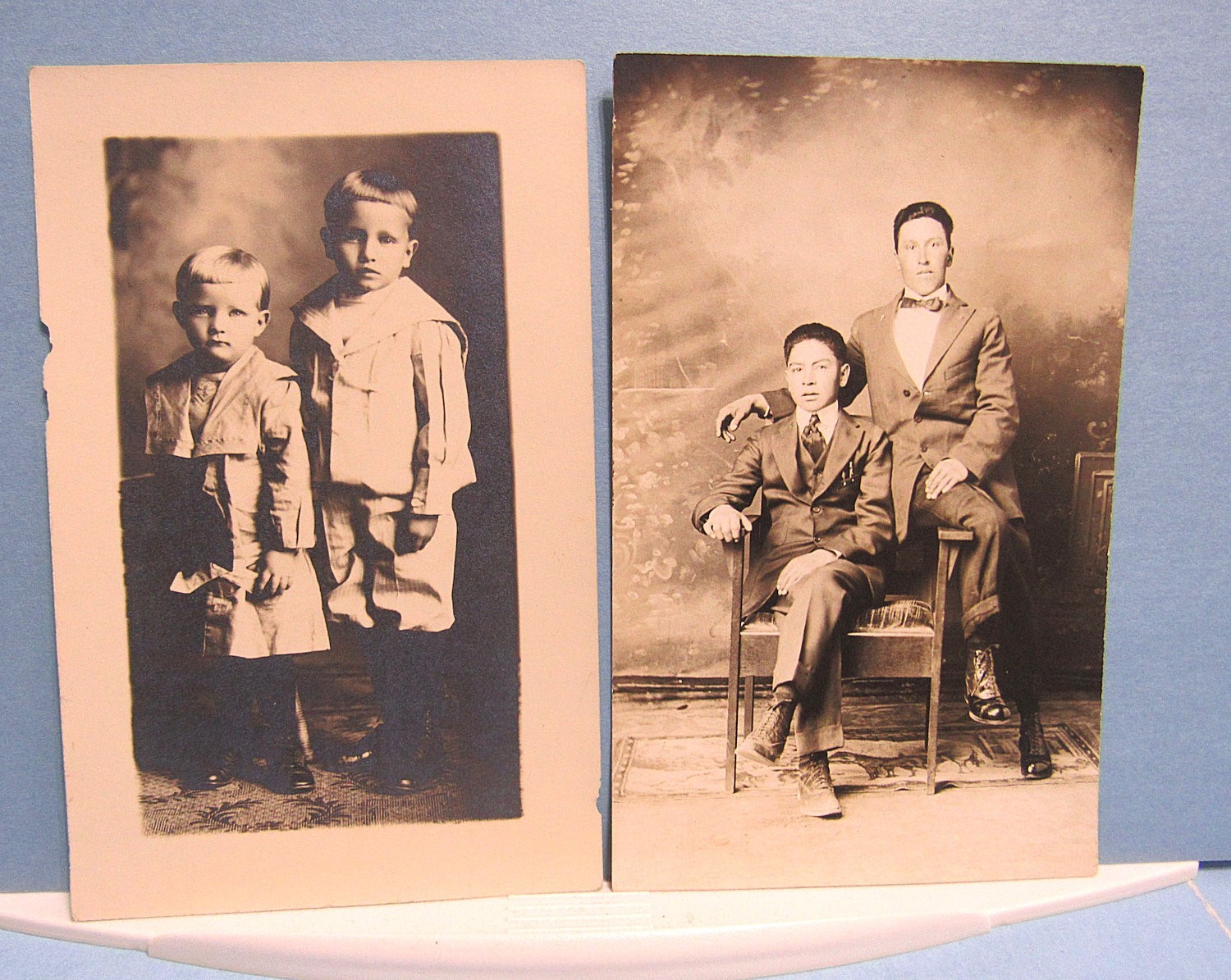2 Vintage RPPC Real Photo POSTCARD Brother Father Son Studio Setting Early 1900s 2 Vintage RPPC Real Photo POSTCARD Brother Father Son Studio Setting Early 1900s
