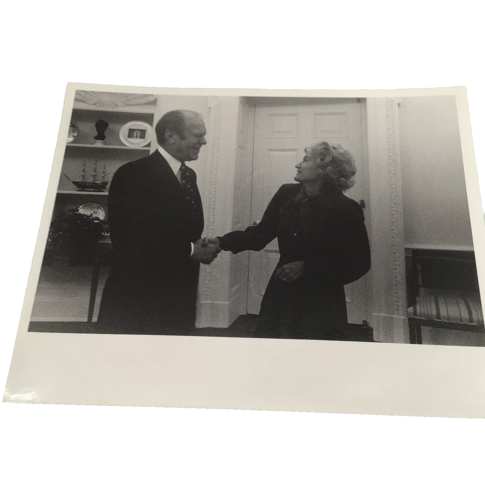 President Ford shaking hands with East Wing Staffer V. Olson- Official WH PHOTO