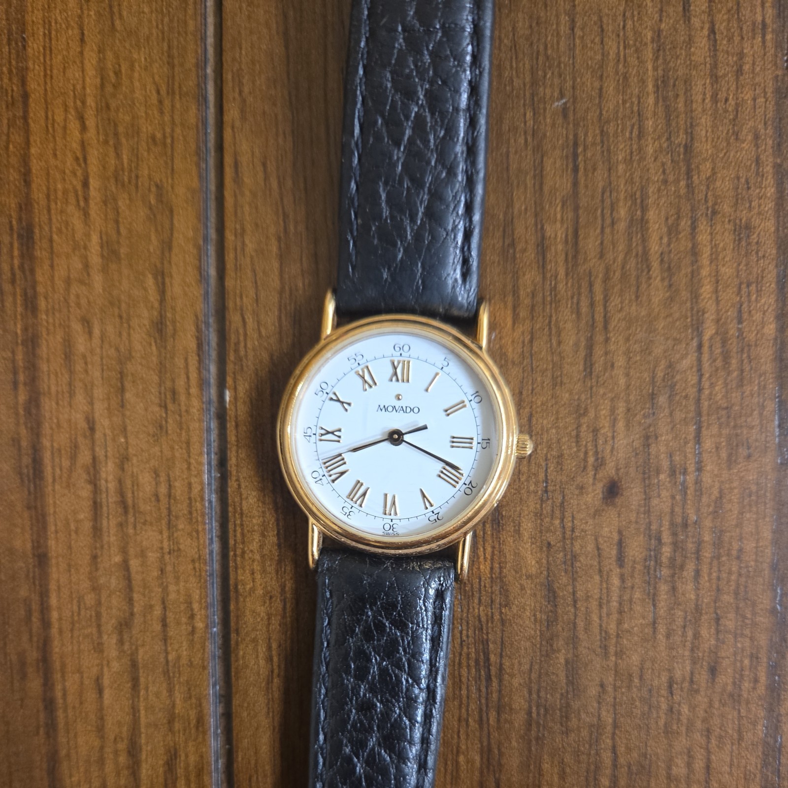 Movado Women'8747-825 Jeweled Crown Quartz Watch the glass is a little scratched Movado Women'8747-825 Jeweled Crown Quartz Watch the glass is a little scratched