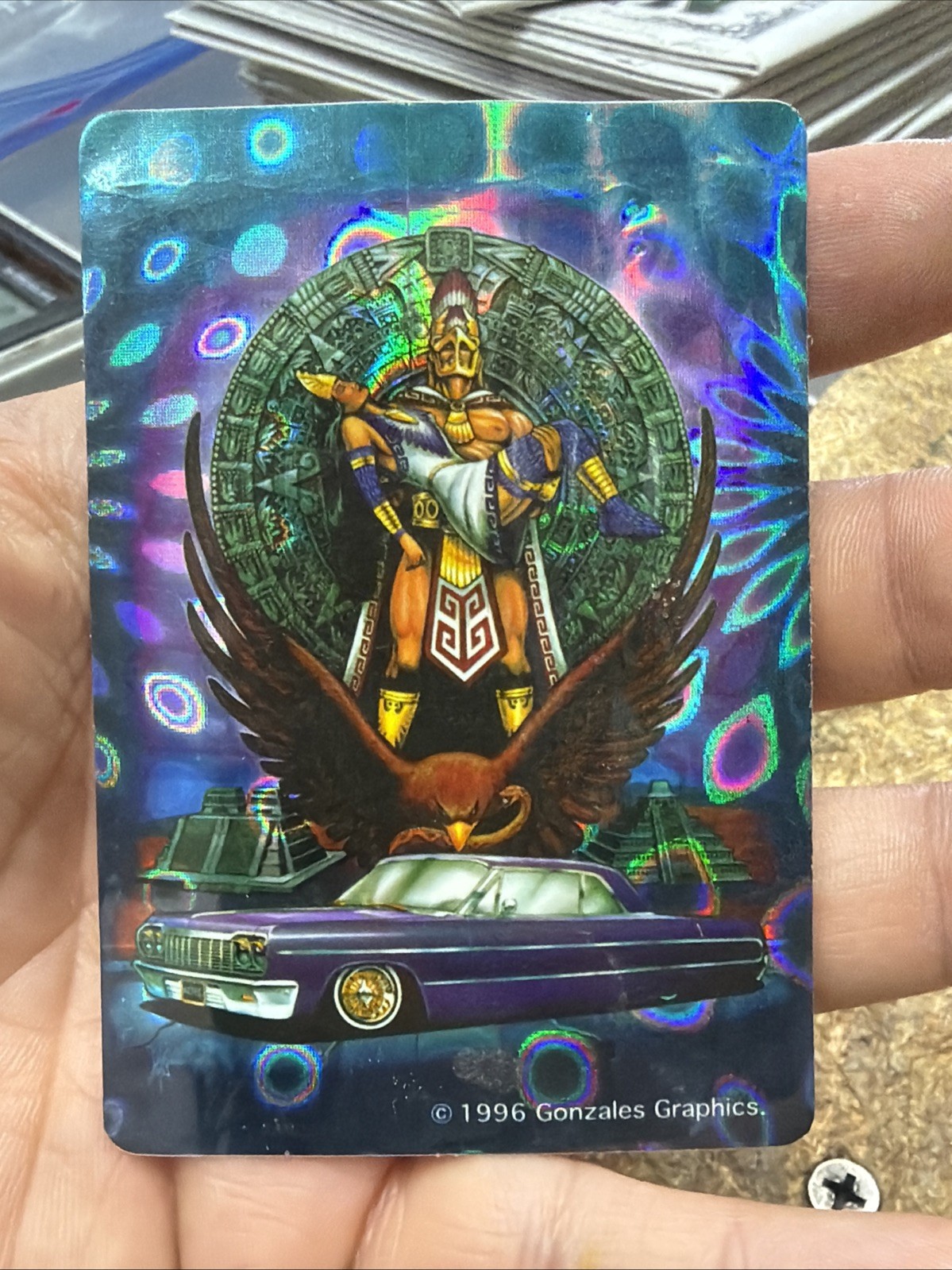 1996 Gonzales Graphics Aztec Man Holding Woman Lowrider Vending Sticker Card