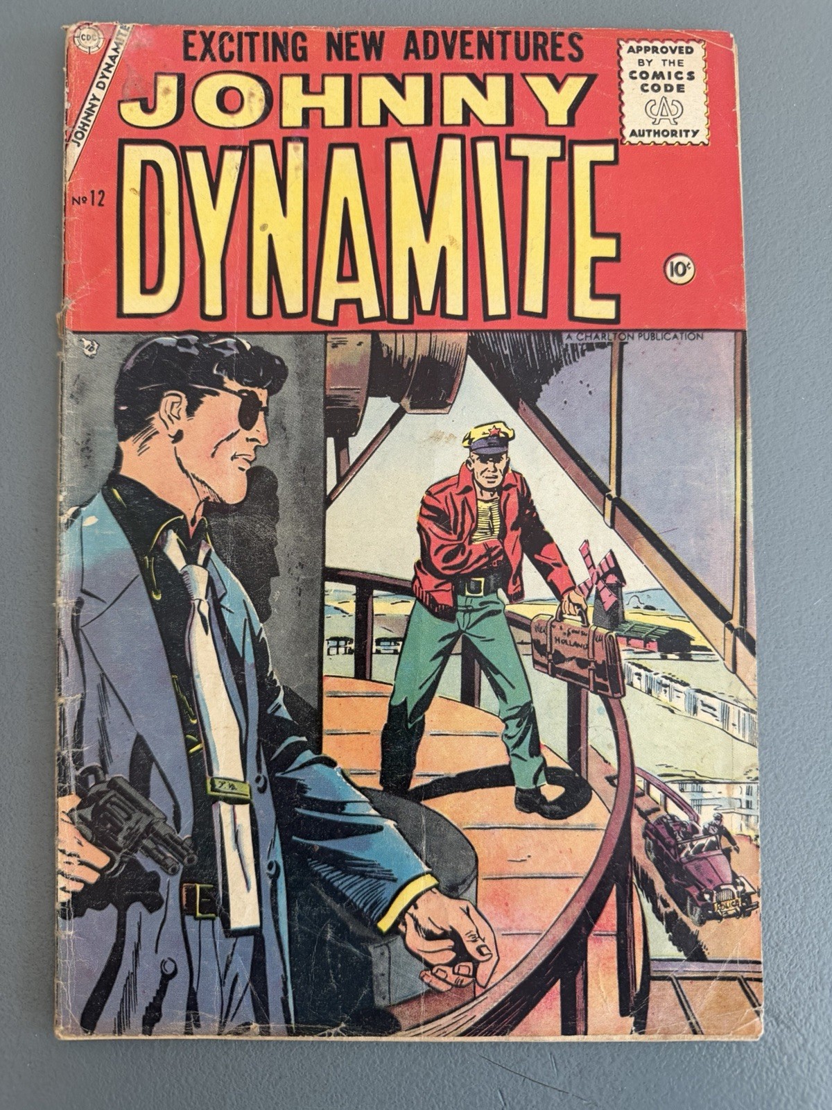Johnny Dynamite #12 (1955) Charlton GD/VG Johnny Dynamite #12 (1955) Charlton GD/VG