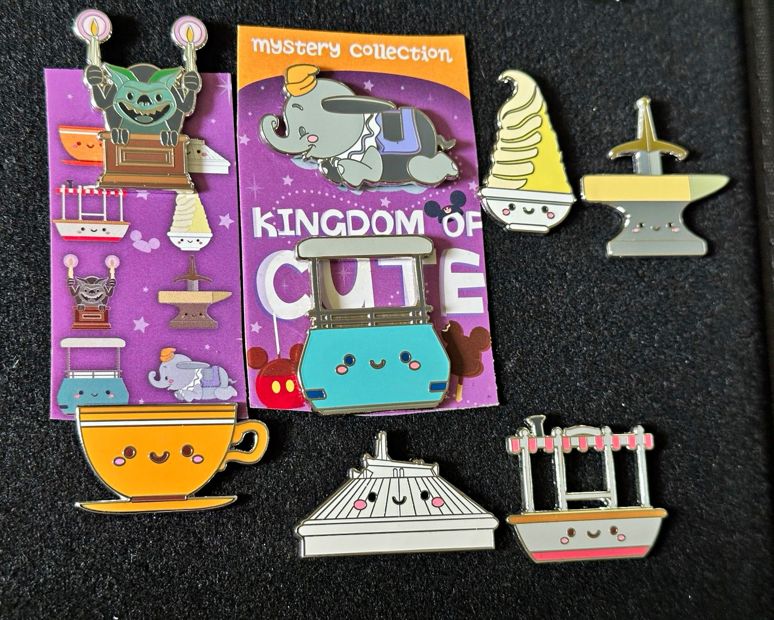Disney Kingdom of Cute Attractions mystery 8 Pin Set