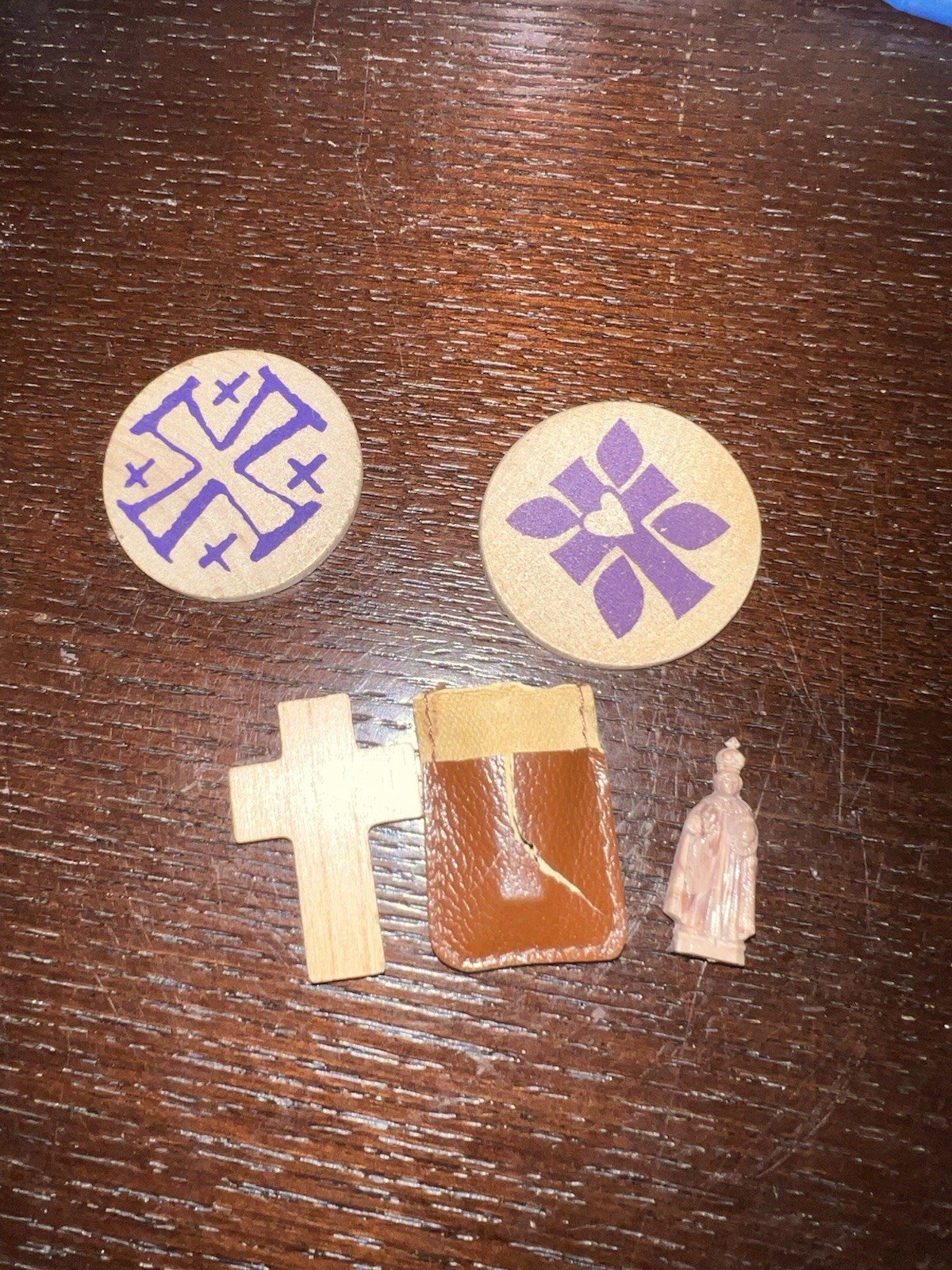 Collection of small Christian religious items, likely used for personal prayer
