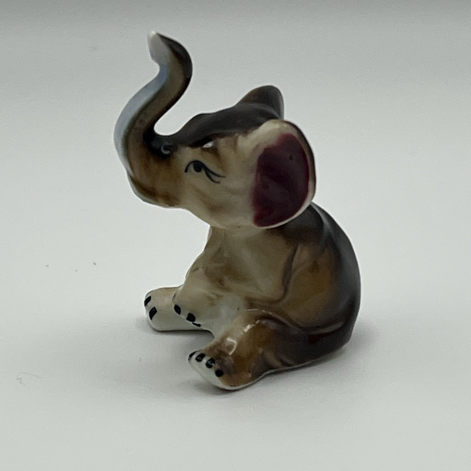 Vintage Mini Ceramic Elephant Figurine Trunk Up Brown Glossy Lucky Elephant 
