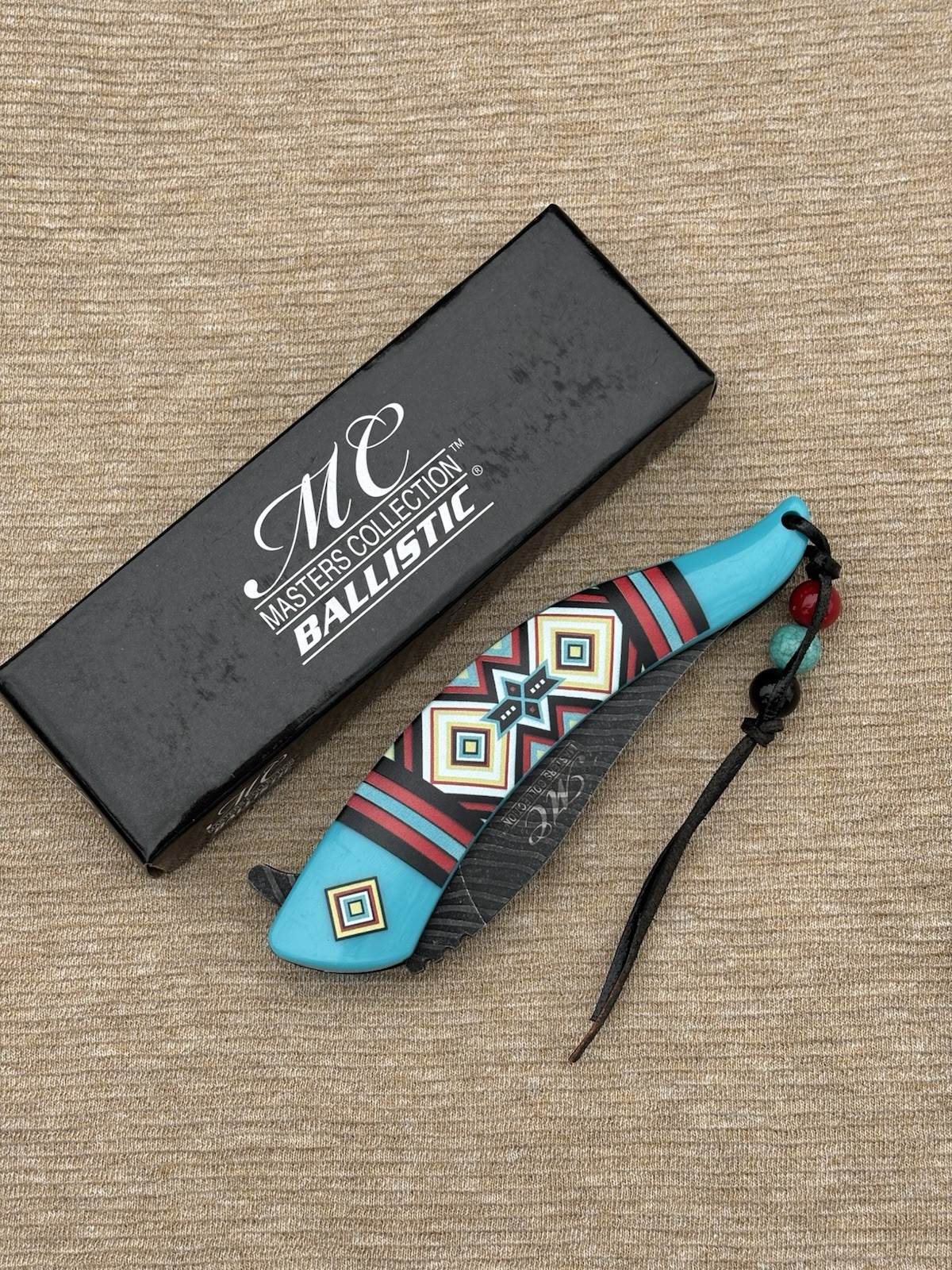 Western Style Pocket Knife Spring Assist Feather Navajo Blue Lanyard Beads Western Style Pocket Knife Spring Assist Feather Navajo Blue Lanyard Beads