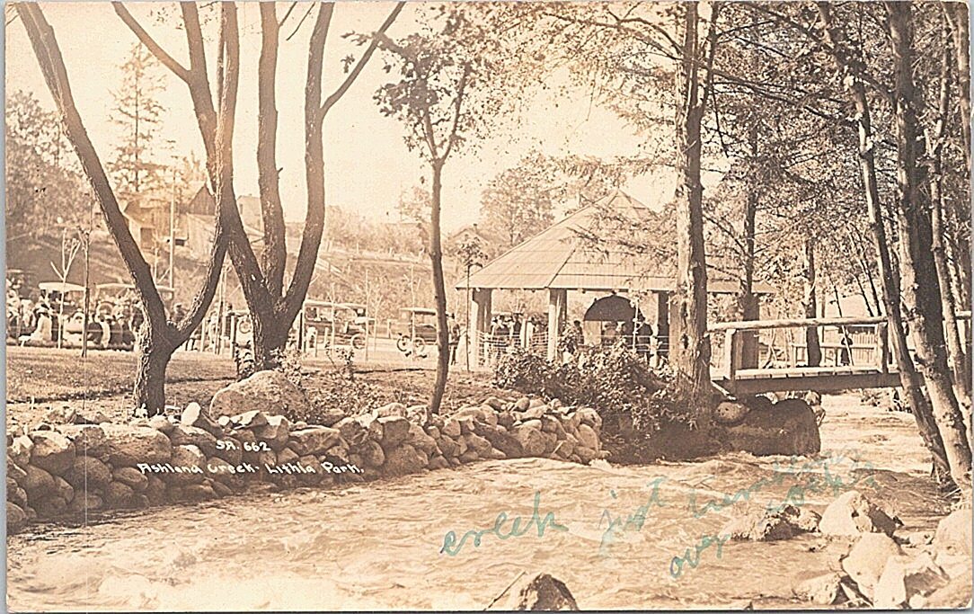 Ashland Oregon RPPC Scene at Lithia Park & creek early 1900s
