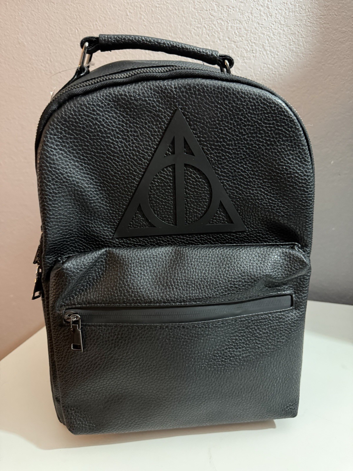 Universal Studios Harry Potter Deathly Hallows Symbol Faux Leather Backpack New