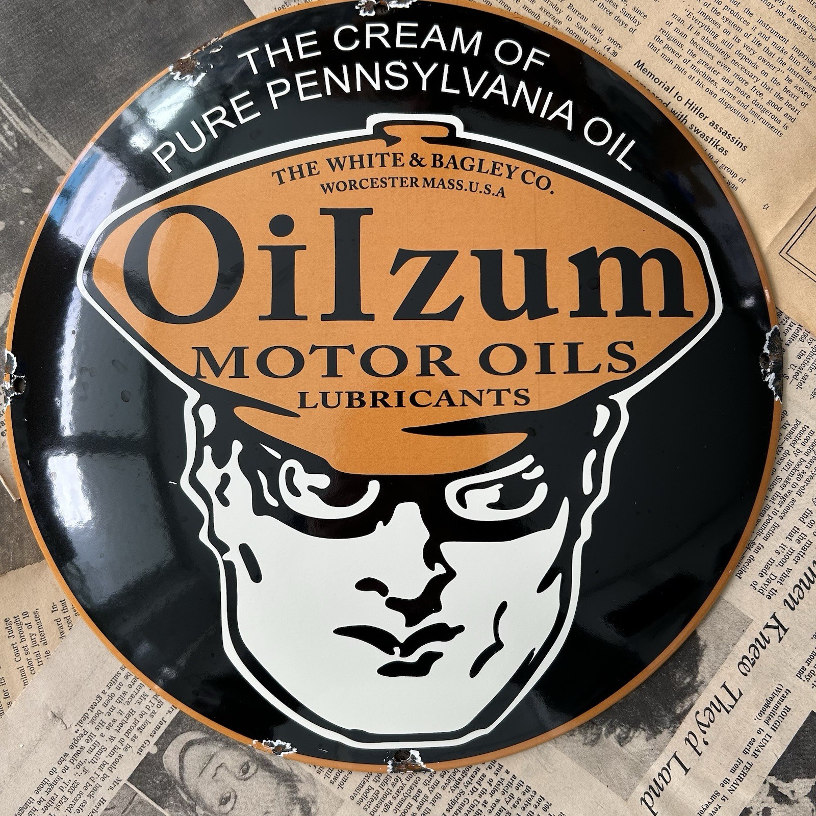 VINTAGE OILZUM MOTOR OILS PENNSYLVANIA 12 INCH CONVEX PORCELAIN ENAMEL SIGN