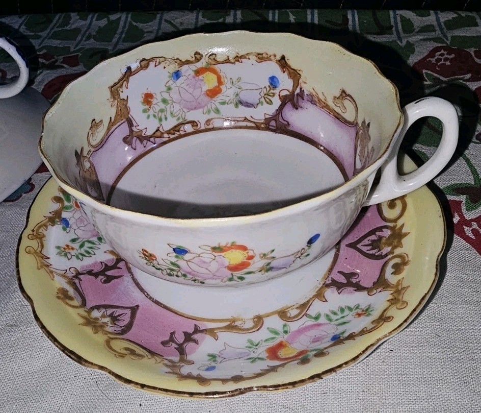vintage, hand-painted porcelain wide-mouth tea cup and saucer set