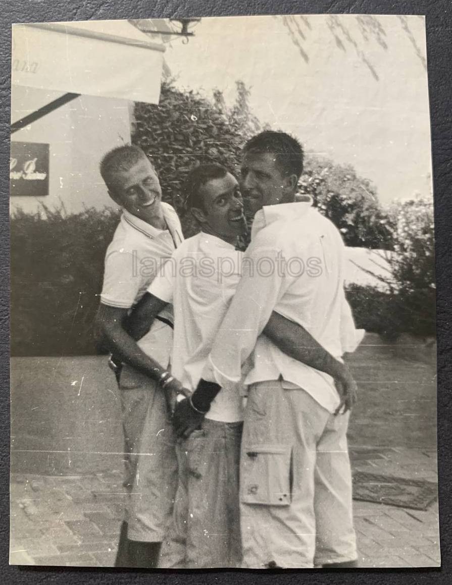 Happy friends Fun Handsome affectionate men Love Hugs Closeness photo Gay Int