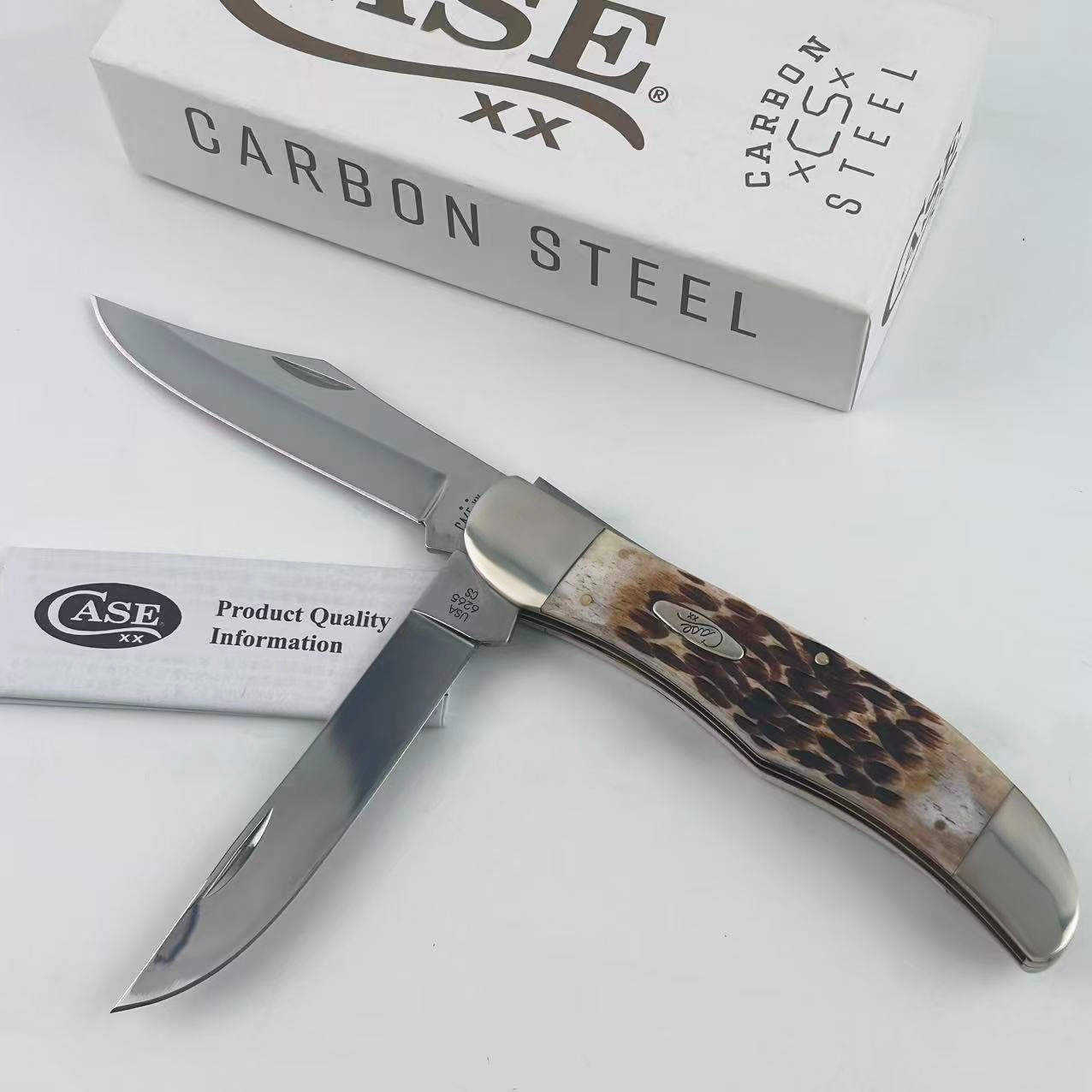 New Case xx Jigged Amber Bone Carbon Steel Folding Hunter Pocket Knife--30093 New Case xx Jigged Amber Bone Carbon Steel Folding Hunter Pocket Knife--30093