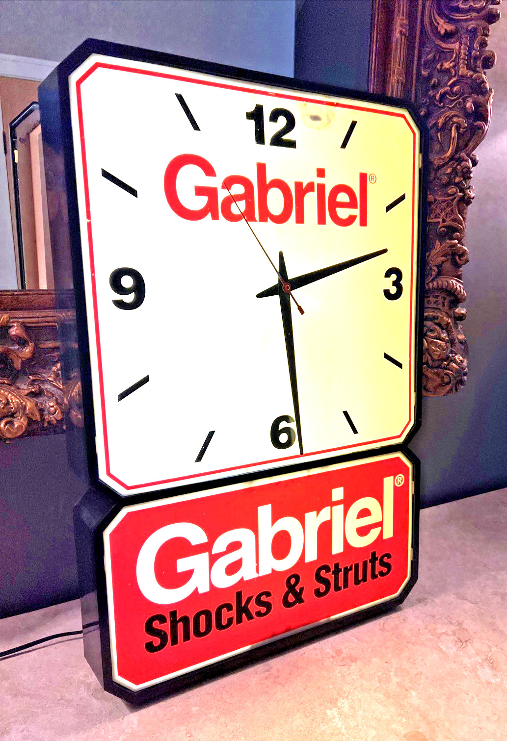 VTG. GABRIEL SHOCKS & STRATS LIGHTED ADVERTISING CLOCK & CLOCK TWO TIER DESIGN