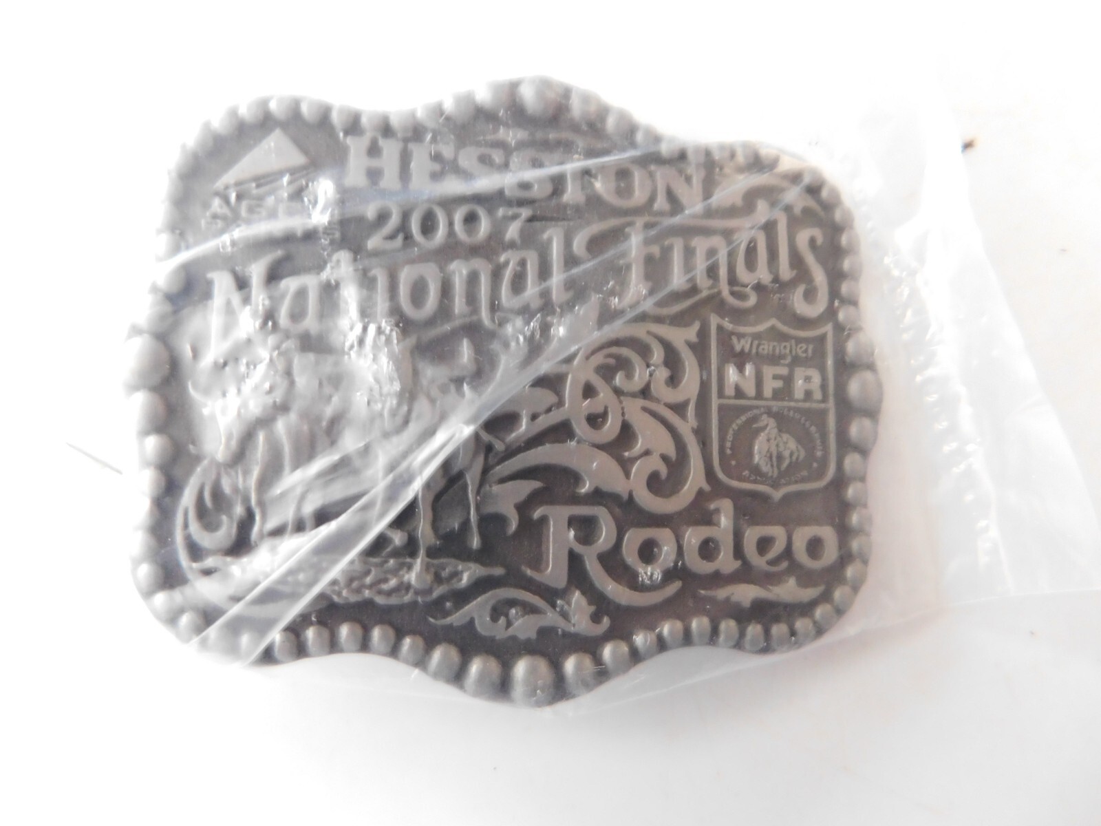 2007 HESSTON MONTANA SILVERSMITH NATIONAL FINALS RODEO  BELT BUCKLE NEW SEALED