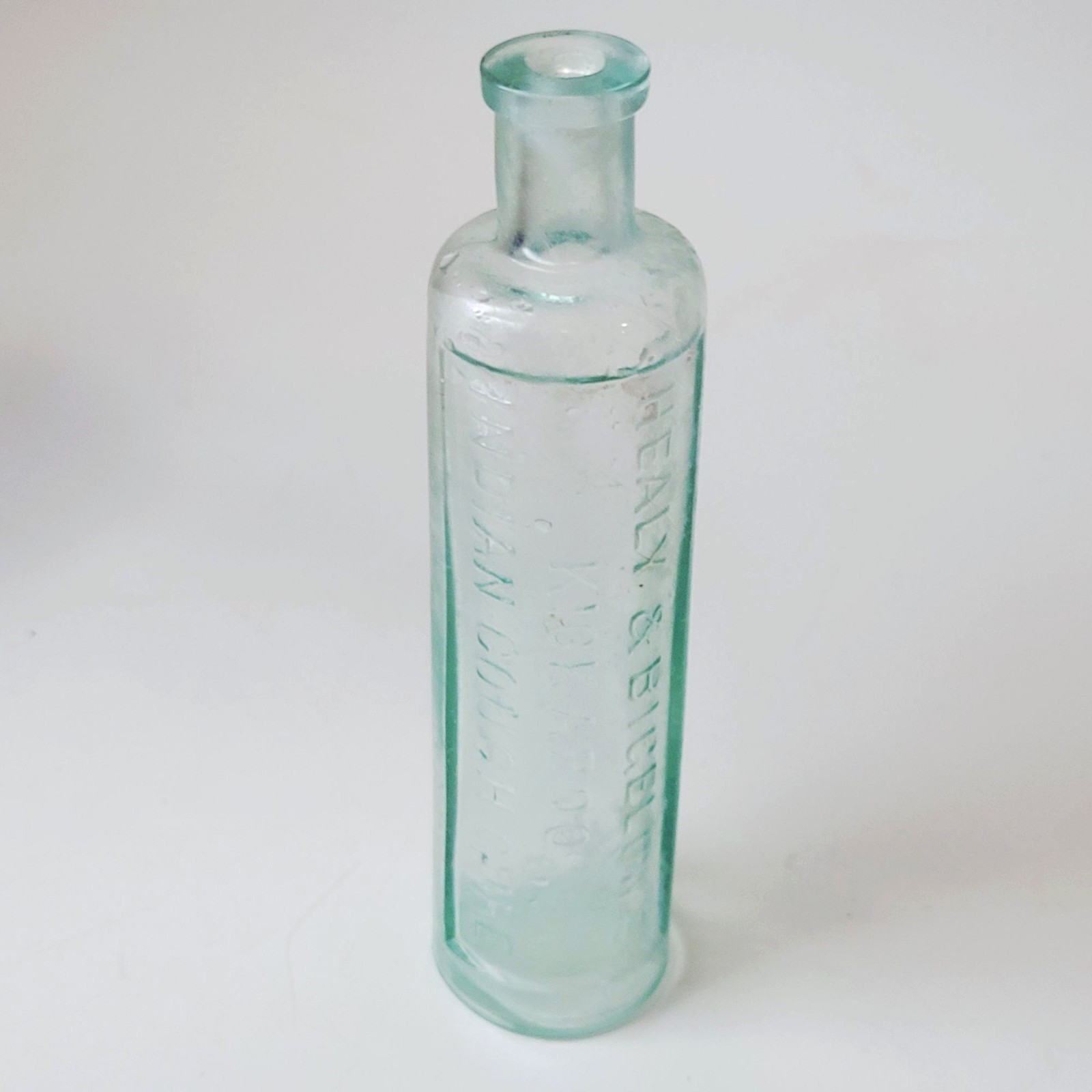 Antique Healy & Bigelow Kickapoo Indian Cough Cure Embossed Aqua Glass Bottle