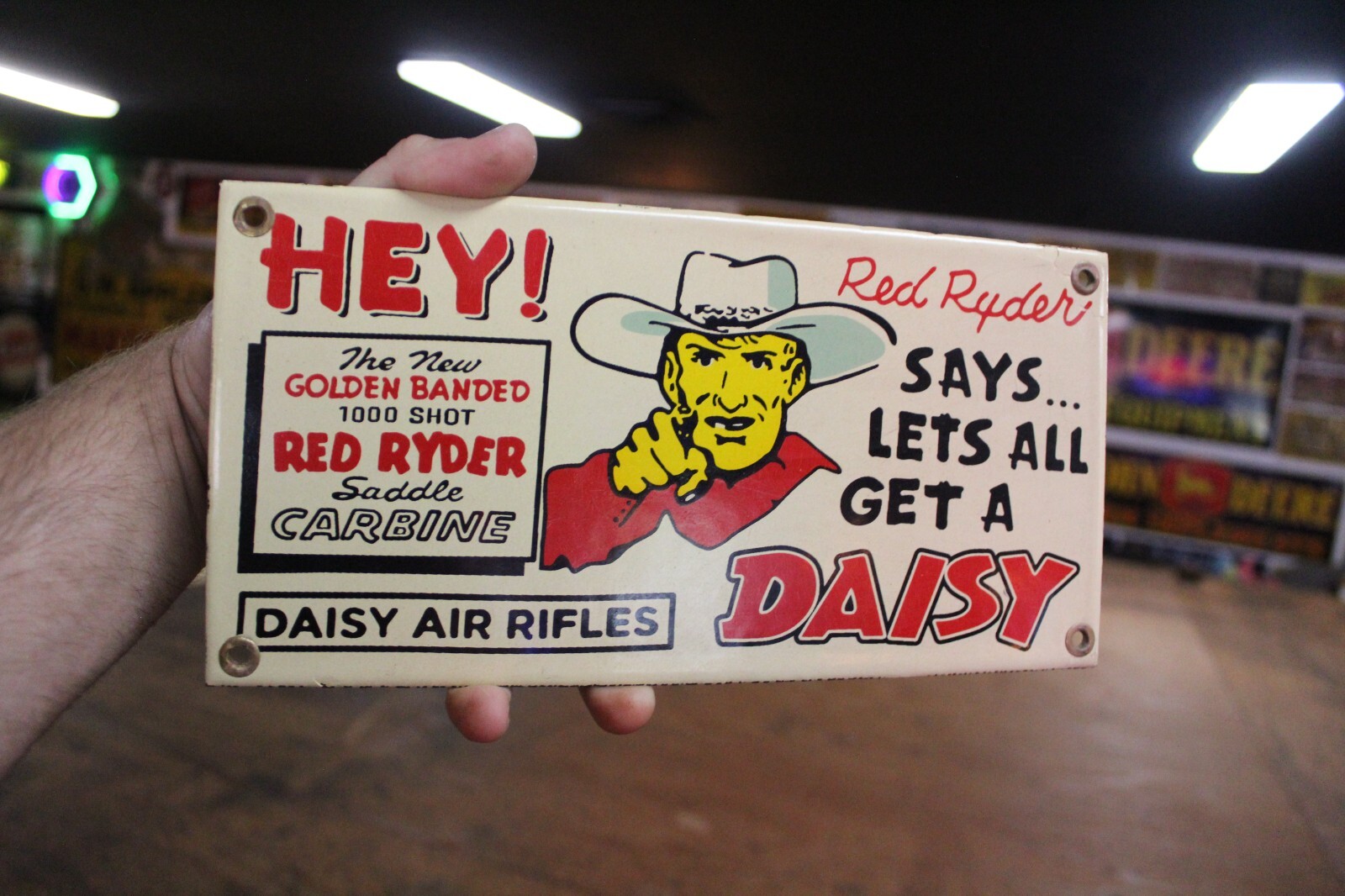 RARE RED RYDER DAISY 1000 SHOT AIR RIFLE DEALER PORCELAIN METAL TOPPER SIGN GUN