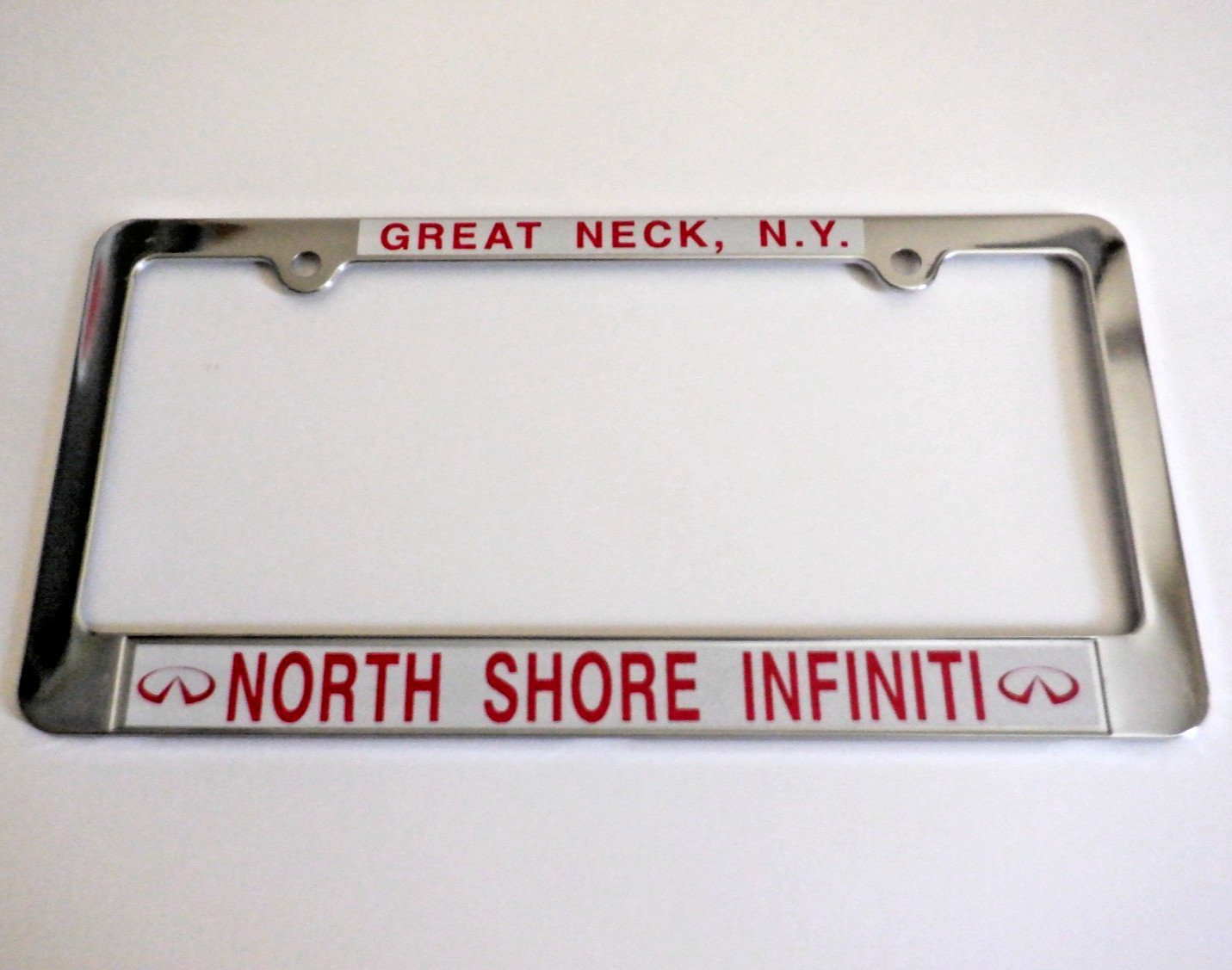 NOS North Shore INFINITI GREAT NECK NY Dealer LICENSE PLATE FRAME Nissan Datsun