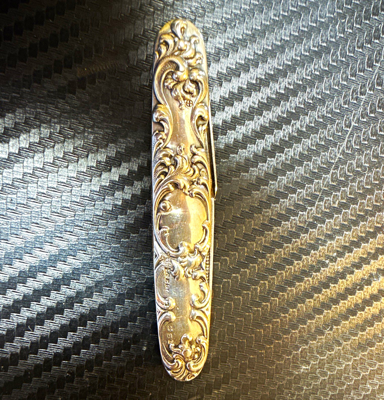 Antique sterling silver-handled pocket knife, from around 1890 to 1915. USA