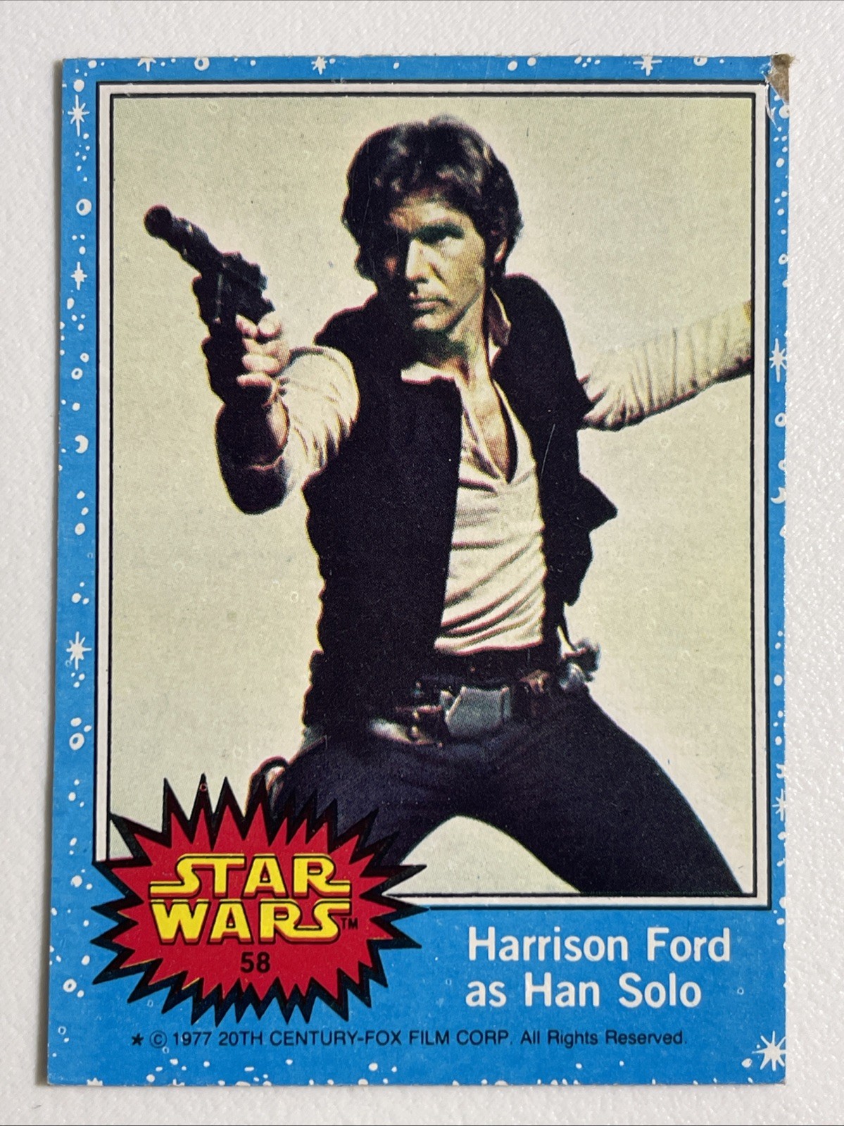 1977 Topps Star Wars #58 Harrison Ford as Han Solo Blue Border Series 1 Vintage