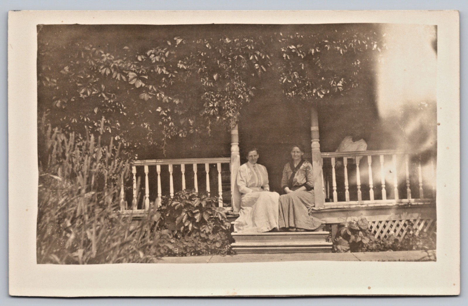Antique RPPC KRUXO Real Photo Postcard Two Women on Porch c1907-1922 Unused