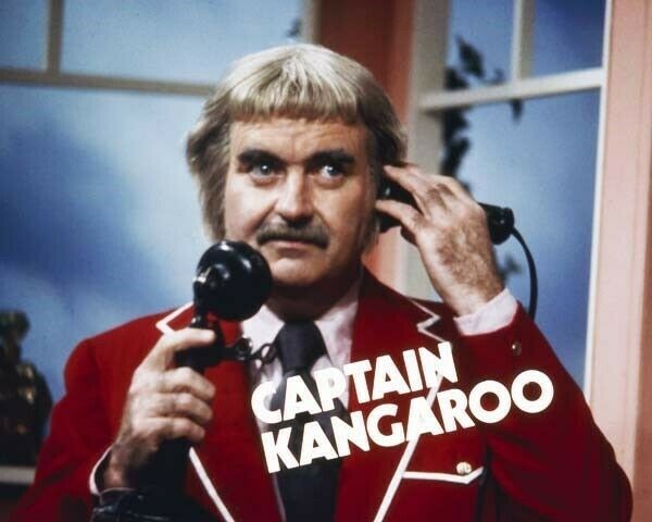 Captain Kangaroo Bob Keeshan in red jacket holding telephone 12x18 inch Poster