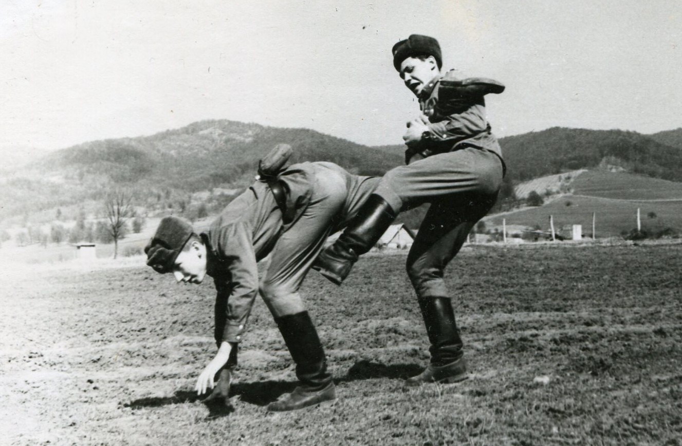 Handsome young men soldiers have fun training fight odd gay vintage photo