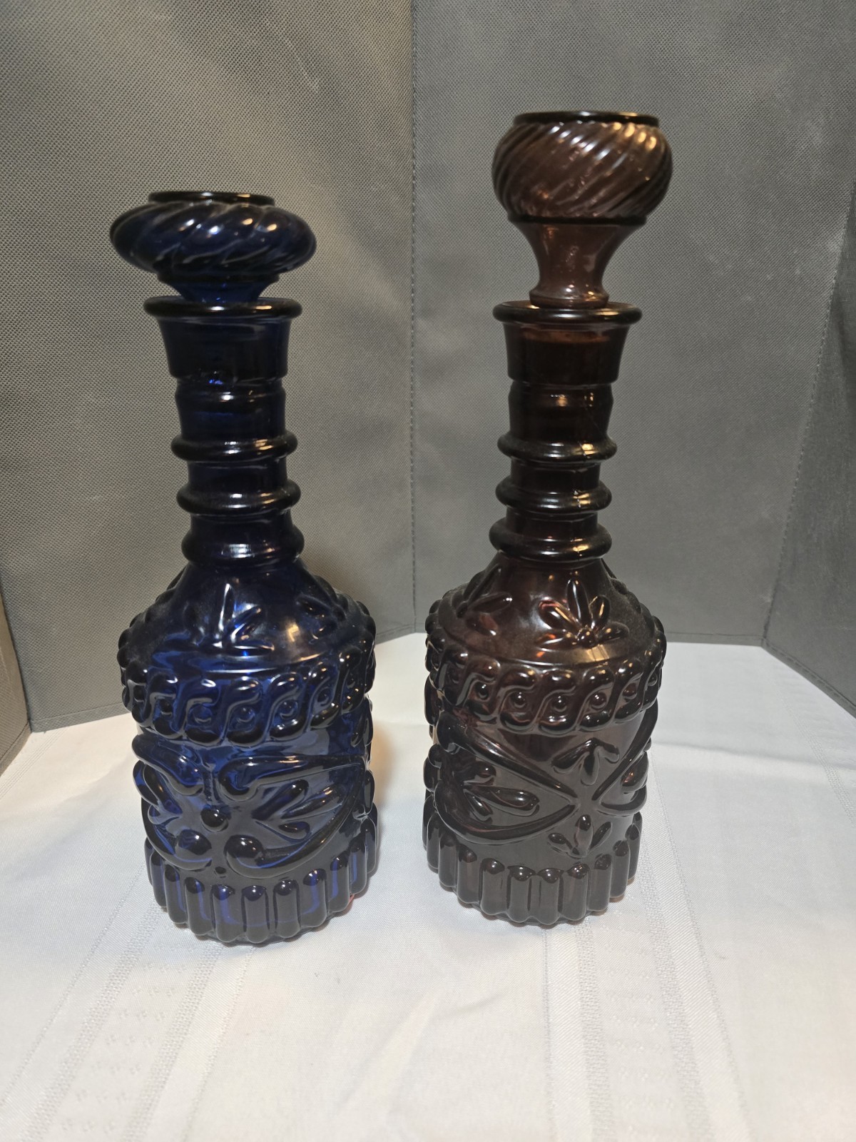 Two (2) Vintage 1974 Glass Jim Beam Whiskey Bottle Decanters Dusty Rose And Blue