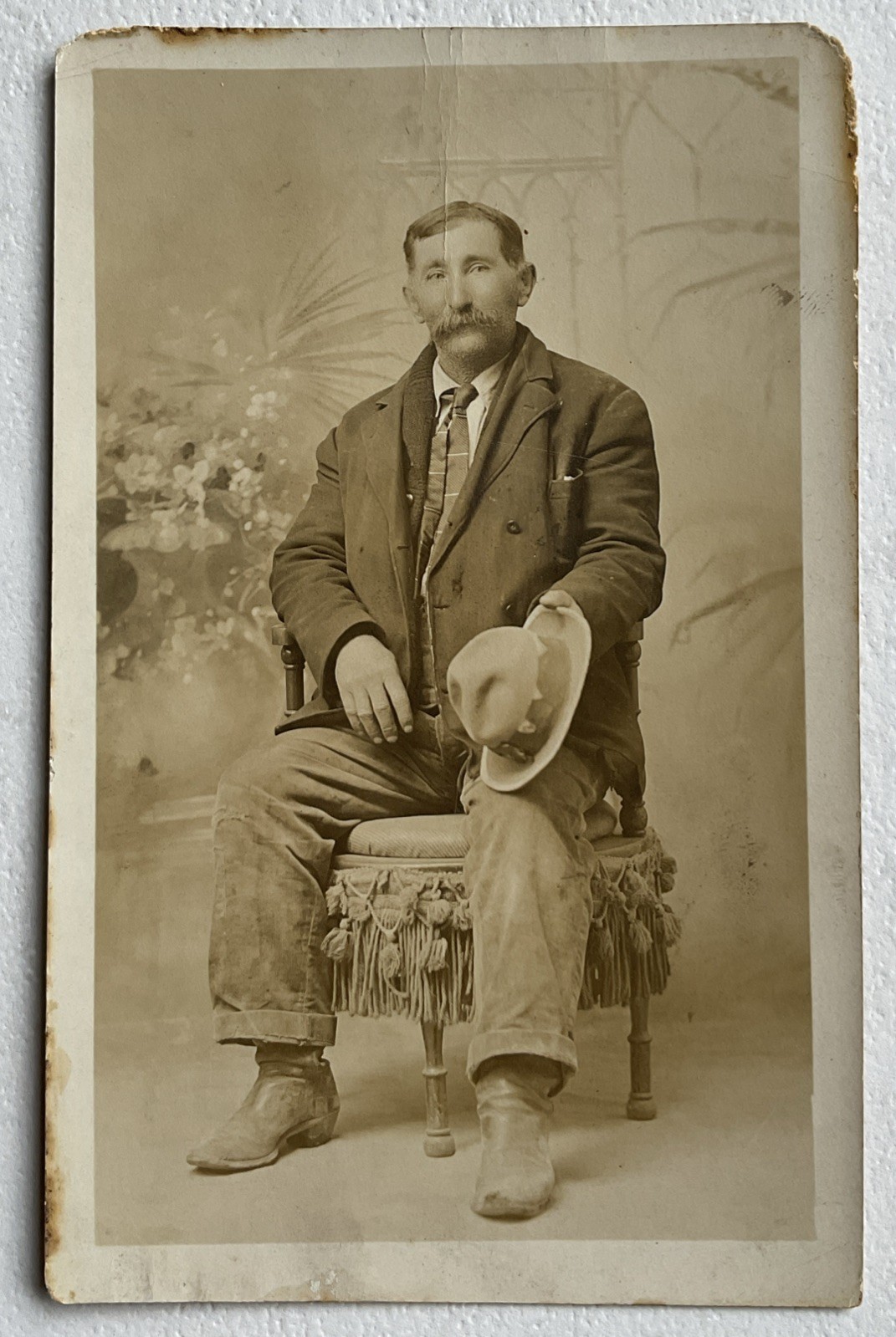 RPPC Postcard Man Wearing Rugged Looking Clothes And Boots Holding Hat