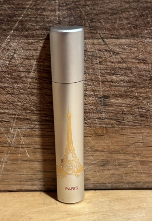 Silver tone slim lighter with Eiffel Tower and 