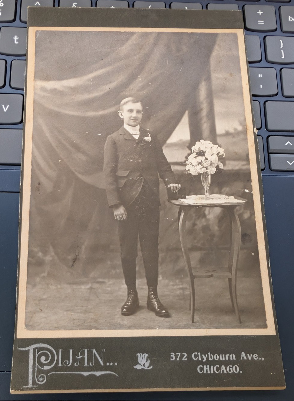 1905's CABINET CARD-Young Boy w/Flowers on table-Photo by PIJAN Brothers CHICAGO