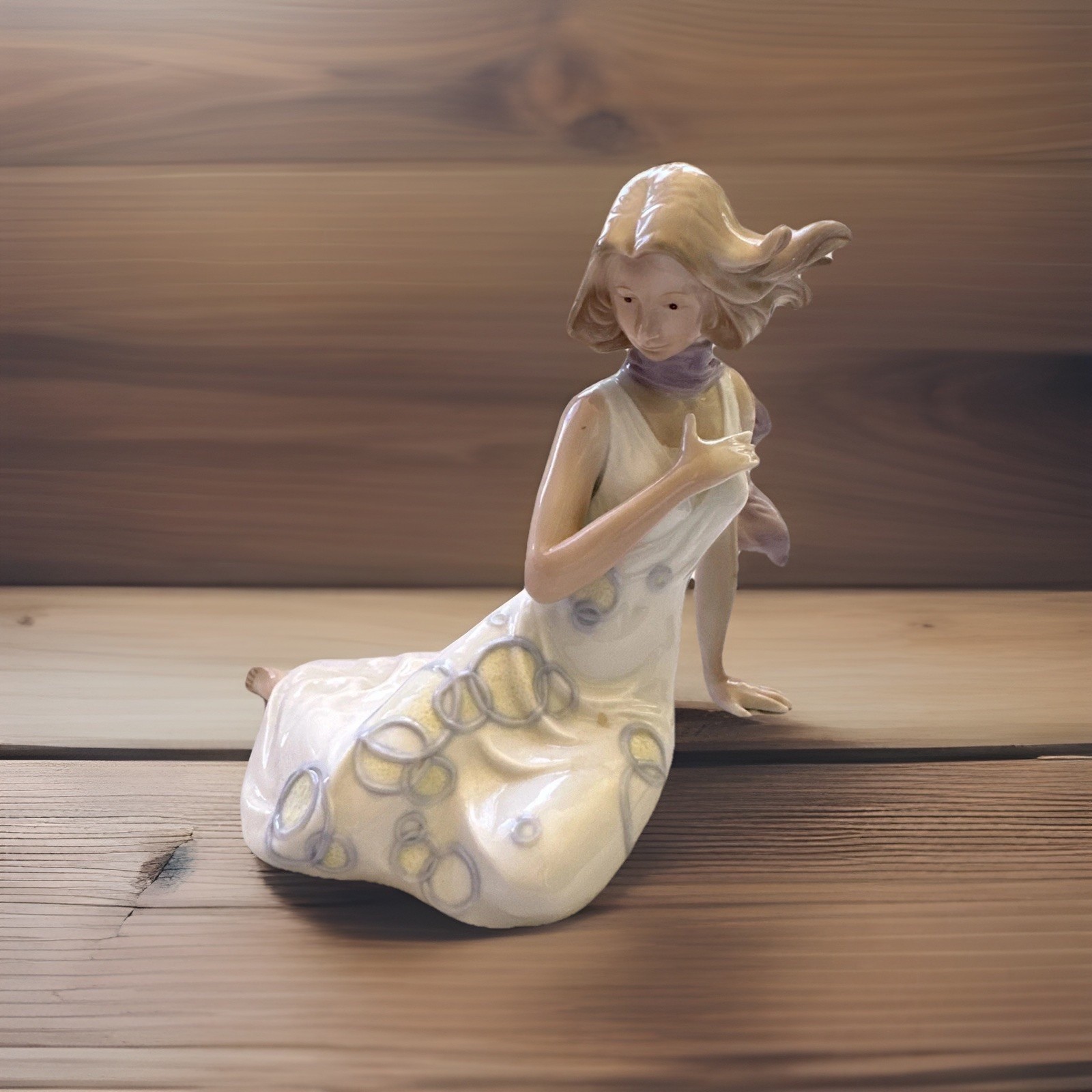 Unique mid century Lady Figurine sitting with wind blowing hair 6x6 Unique mid century Lady Figurine sitting with wind blowing hair 6x6