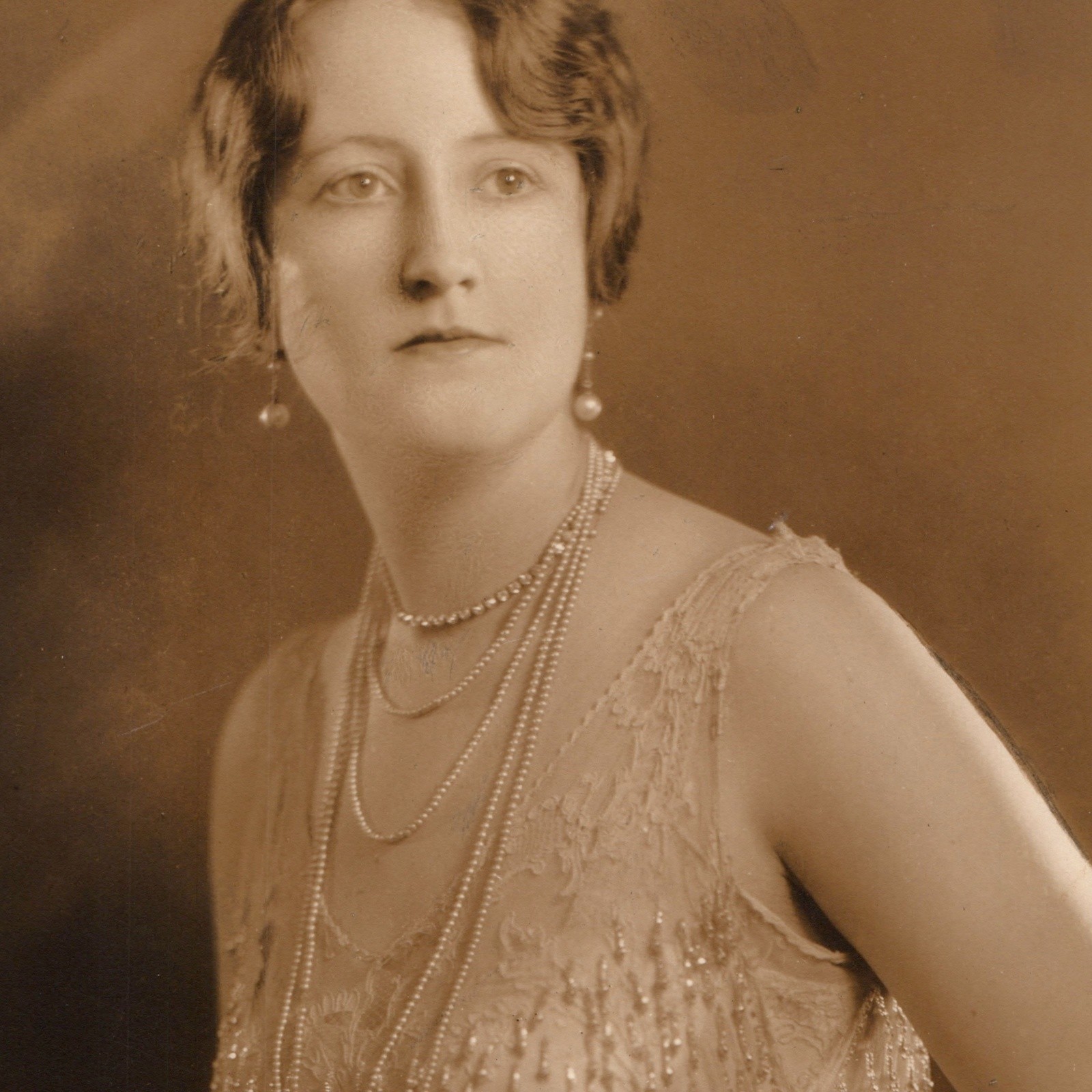 1925 Nancianna Flapper Woman Beaded Fringe Dress, Pearls Studio Portrait Photo