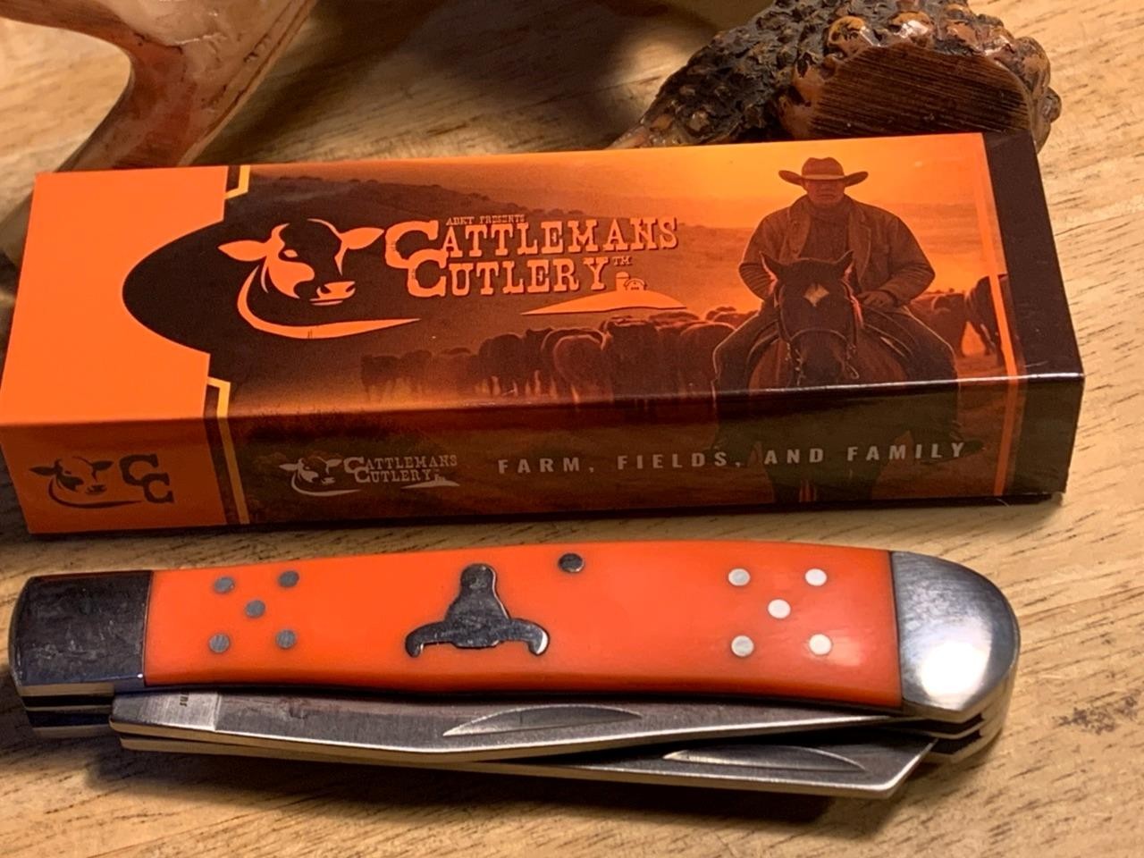 Cattleman\'s Cutlery Orange Delrin Trapper 4 1/8\