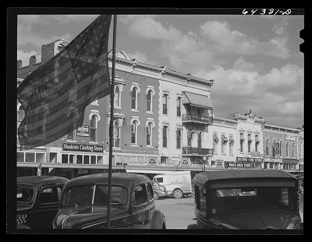 Photo:Nevada Missouri 1942 Downtown Main Street Storefronts Automobiles