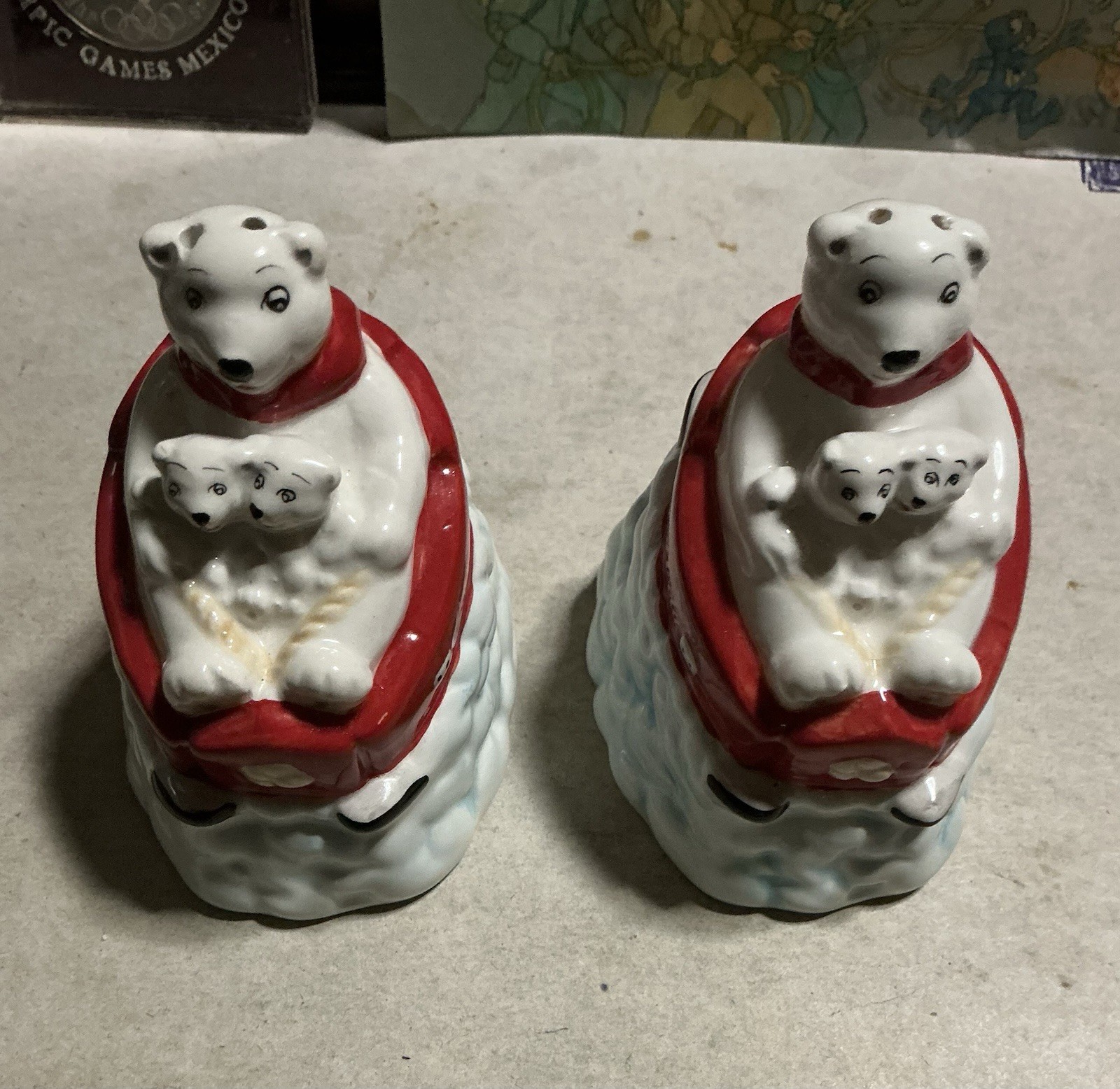Coca-Cola Salt and Pepper Shakers Polar Bear Mama and Cubs on Sleds 