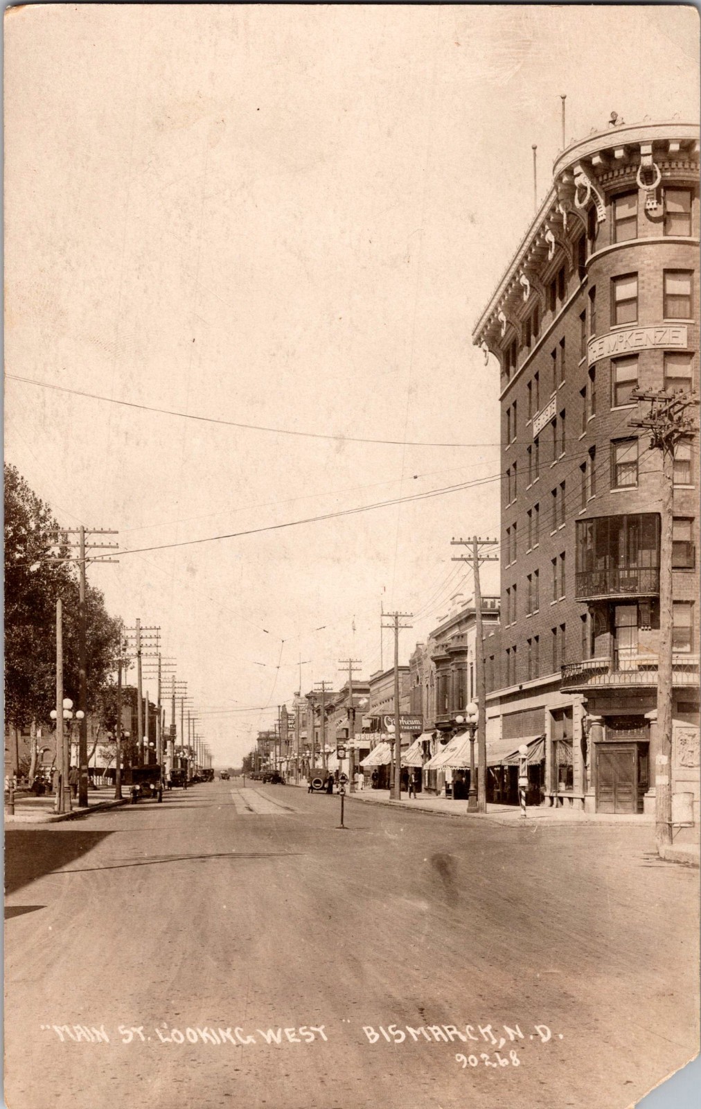 [94i] Postcard Unused RPPC, Main St Looking West, Bismark ND, corner clipped