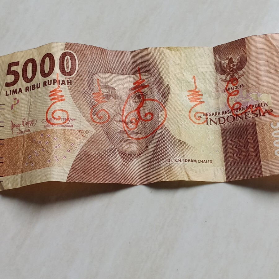 An original indonesian currency wafaq rajah blessed money by spiritualist master