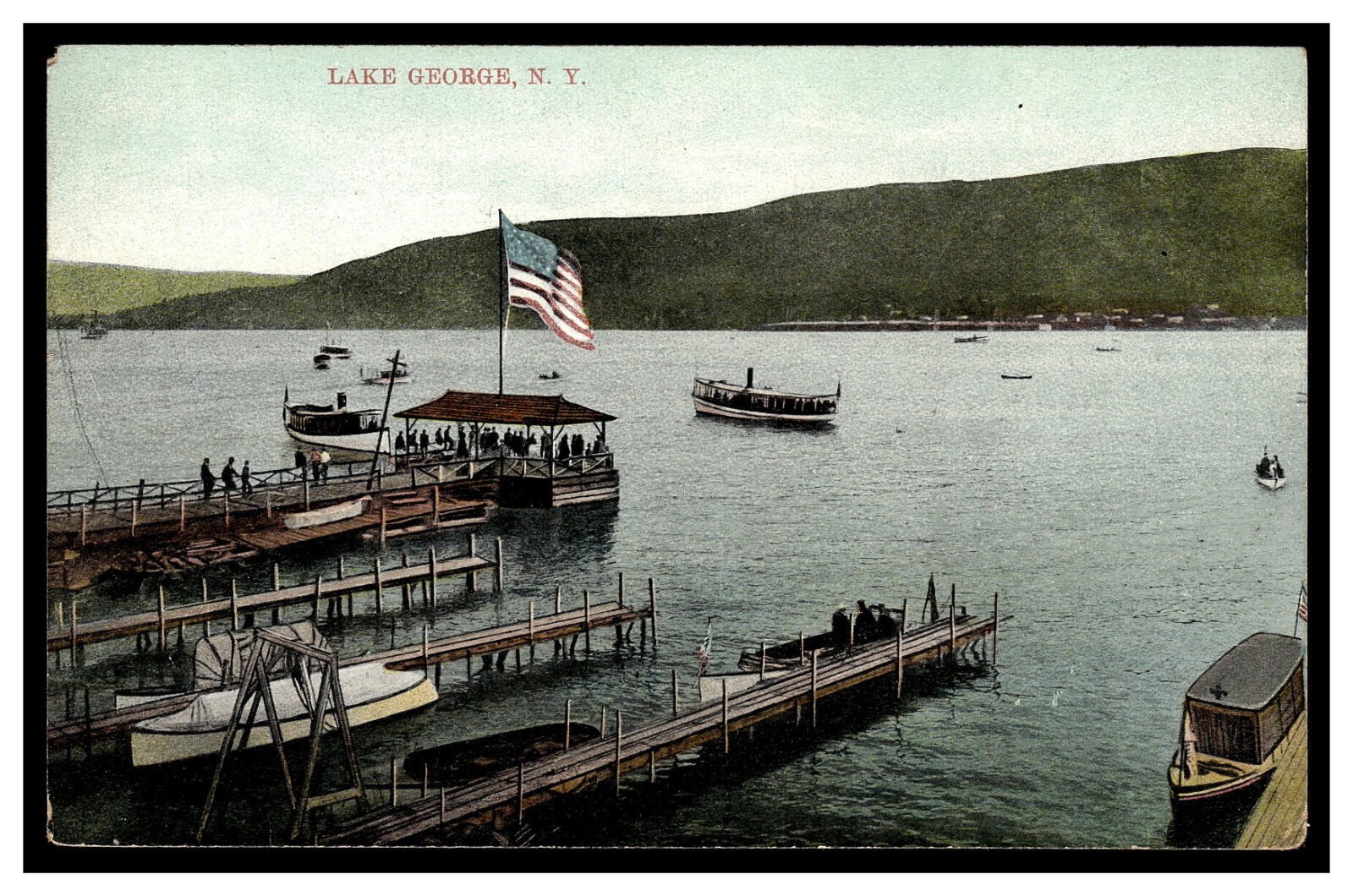 LAKE GEORGE NY VINTAGE POSTCARD 1900'S BOATS DOCKS AMERICAN FLAG GREAT IMAGE