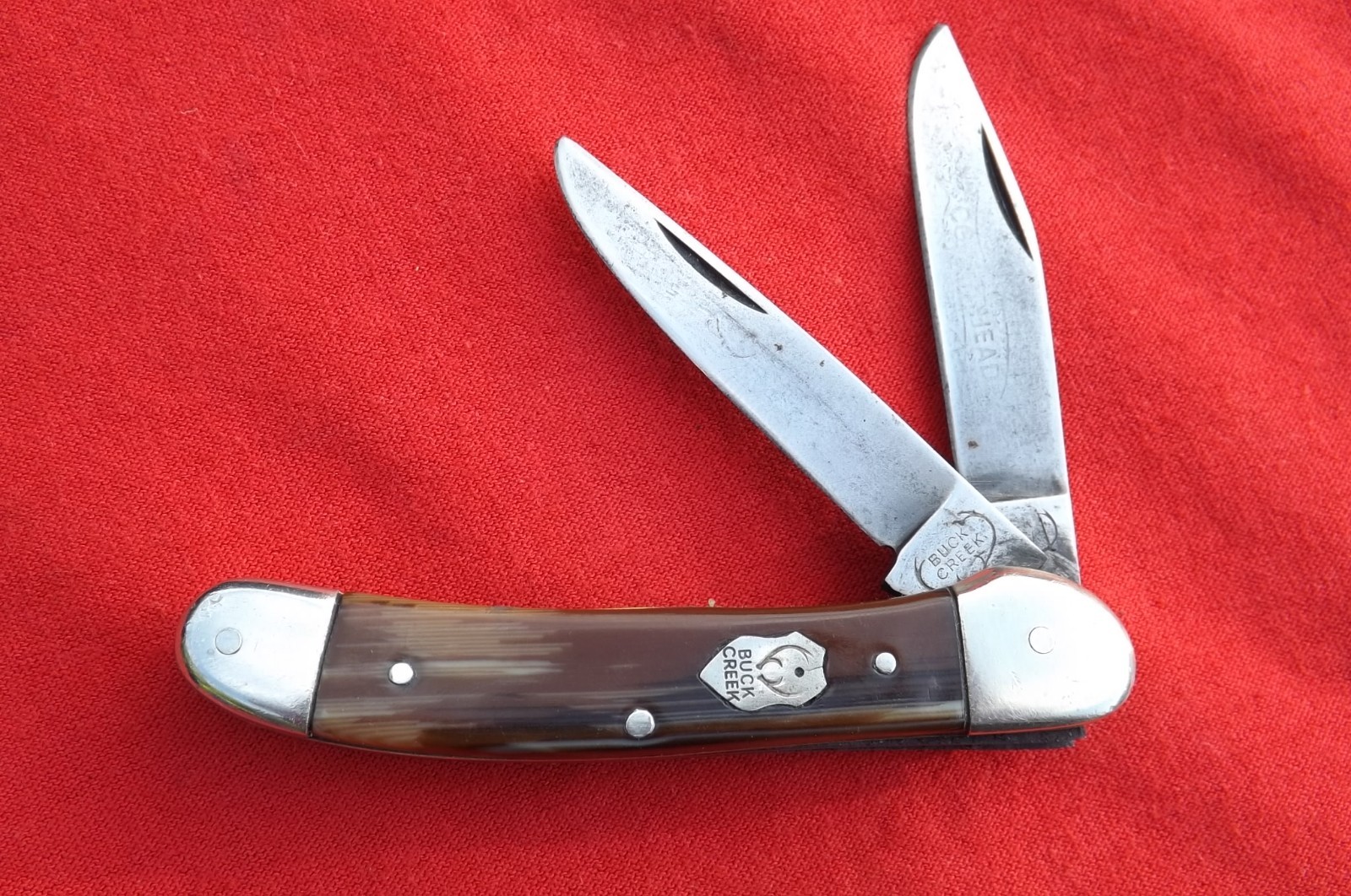 VINTAGE  BUCK CREEK  GERMANY  BROWN STRIPE CELLULOID  COPPERHEAD KNIFE  USED