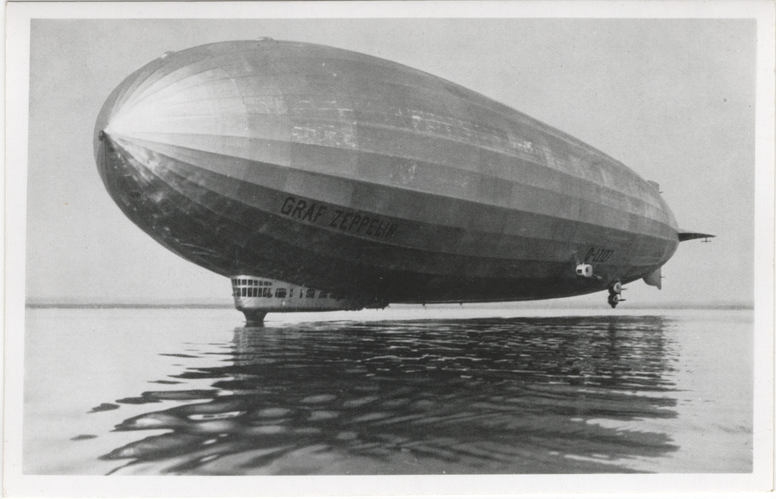Vintage Graf Zeppelin LZ127 Photo Postcard Airship Skimming Low Over Water