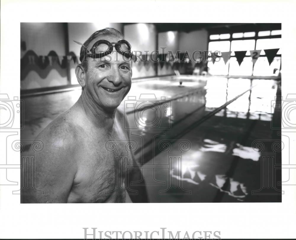 1995 Press Photo Mel Coulon, Senior Olympics competitor tries out swimming