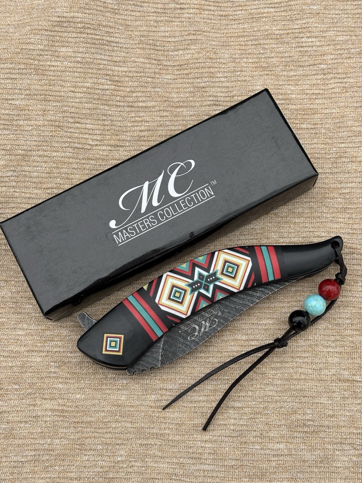 Western Style Pocket Knife Spring Assist Feather Navajo Black Lanyard Western Style Pocket Knife Spring Assist Feather Navajo Black Lanyard